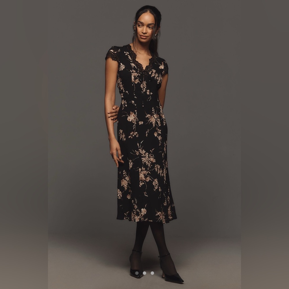 Reformation Tiffie Dress In Navy, brand new without tags, no flaws.